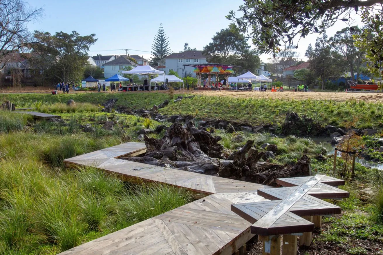 Photo of a pedestrian bridge crossing Te Auaunga